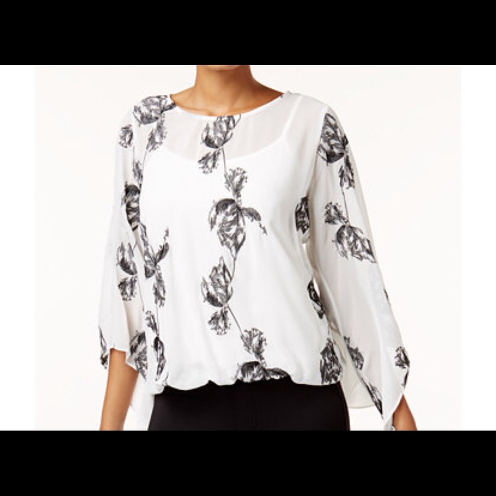 Quintessential women’s black/white bubble hem top